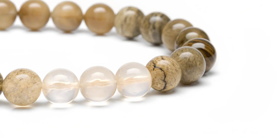 A natural stone and crystal bead bracelet for postbiotics gut health benefits.