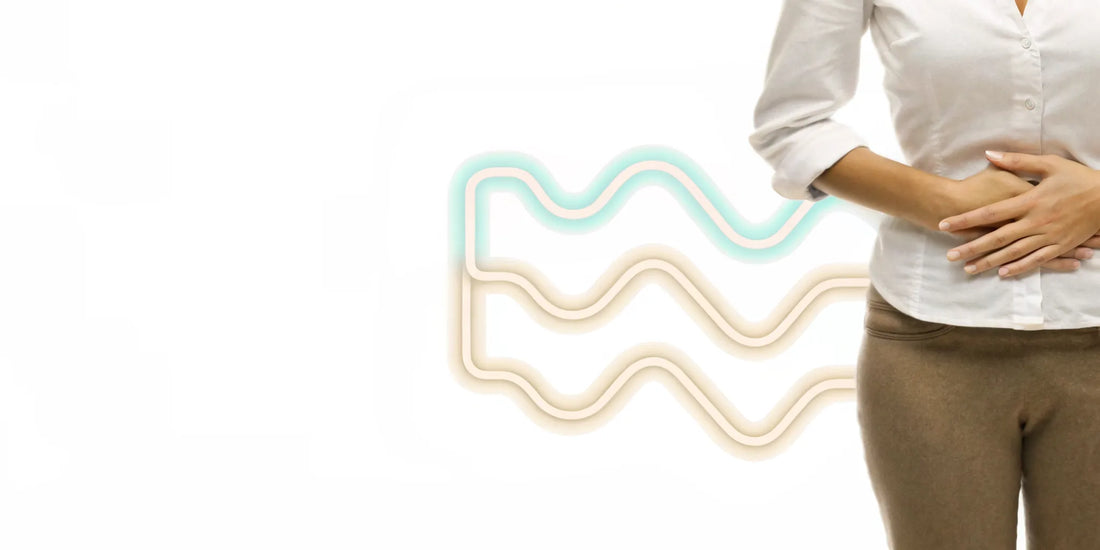 Woman with stomach pain, a key sign of taking too much probiotics.