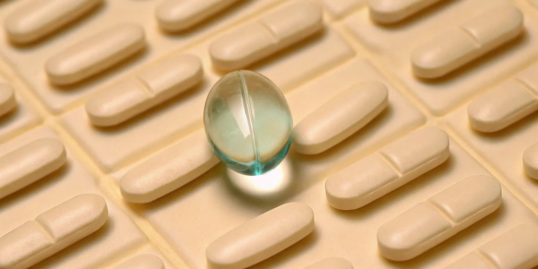 A green postbiotic capsule and white tablets for gut, mood, and immunity benefits.