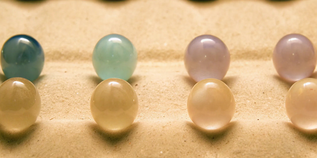Balanced stones on sand for mood balance and anxiety relief.