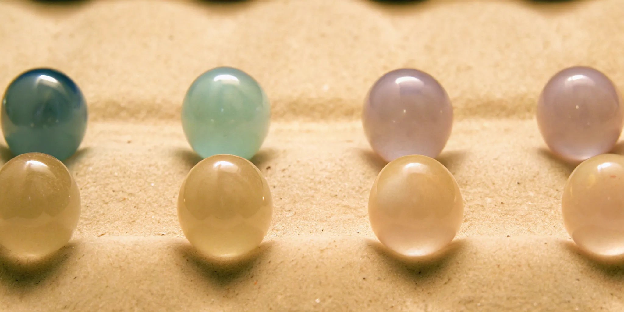 Balanced stones on sand for mood balance and anxiety relief.
