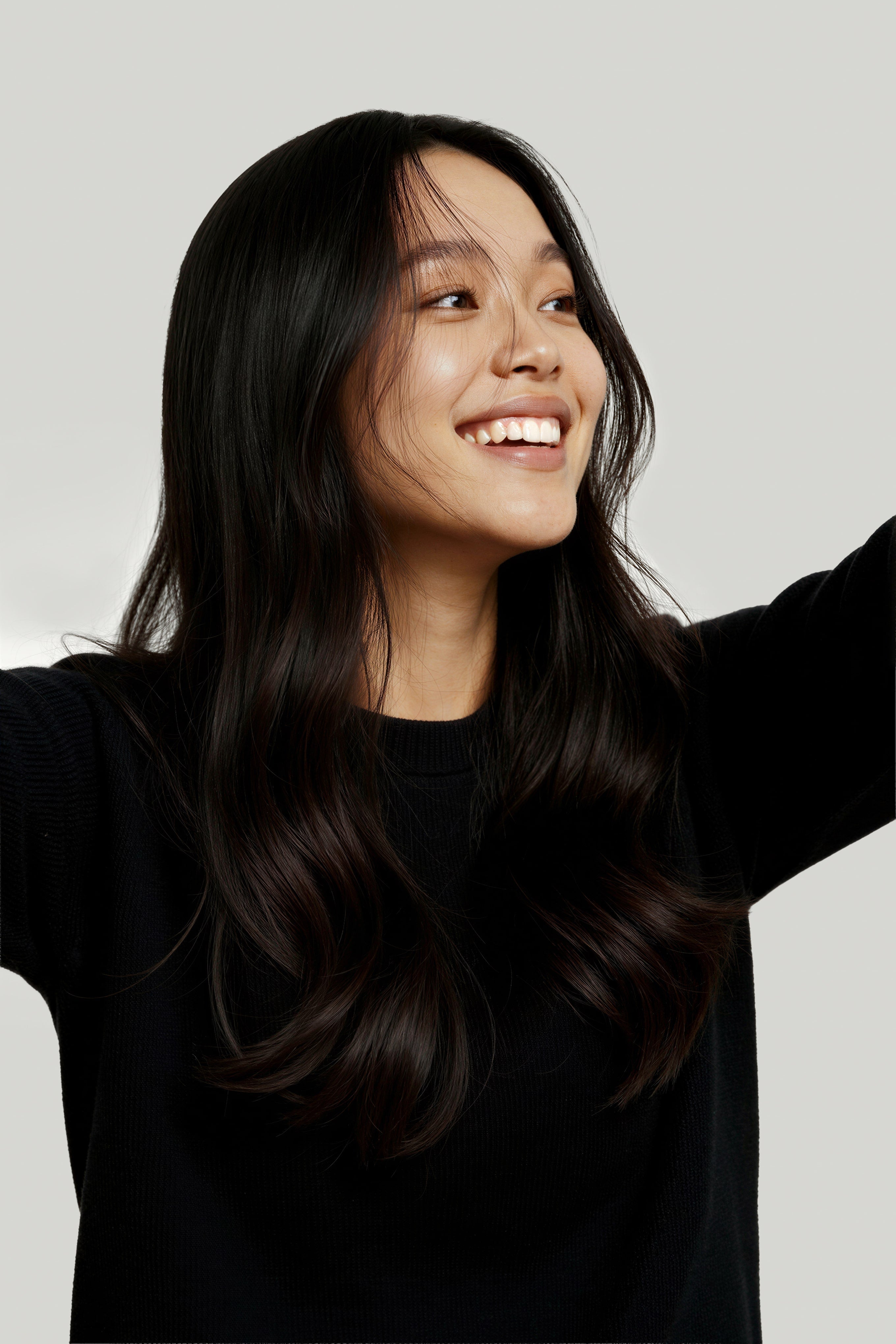 woman happy from debloating, what is bloating