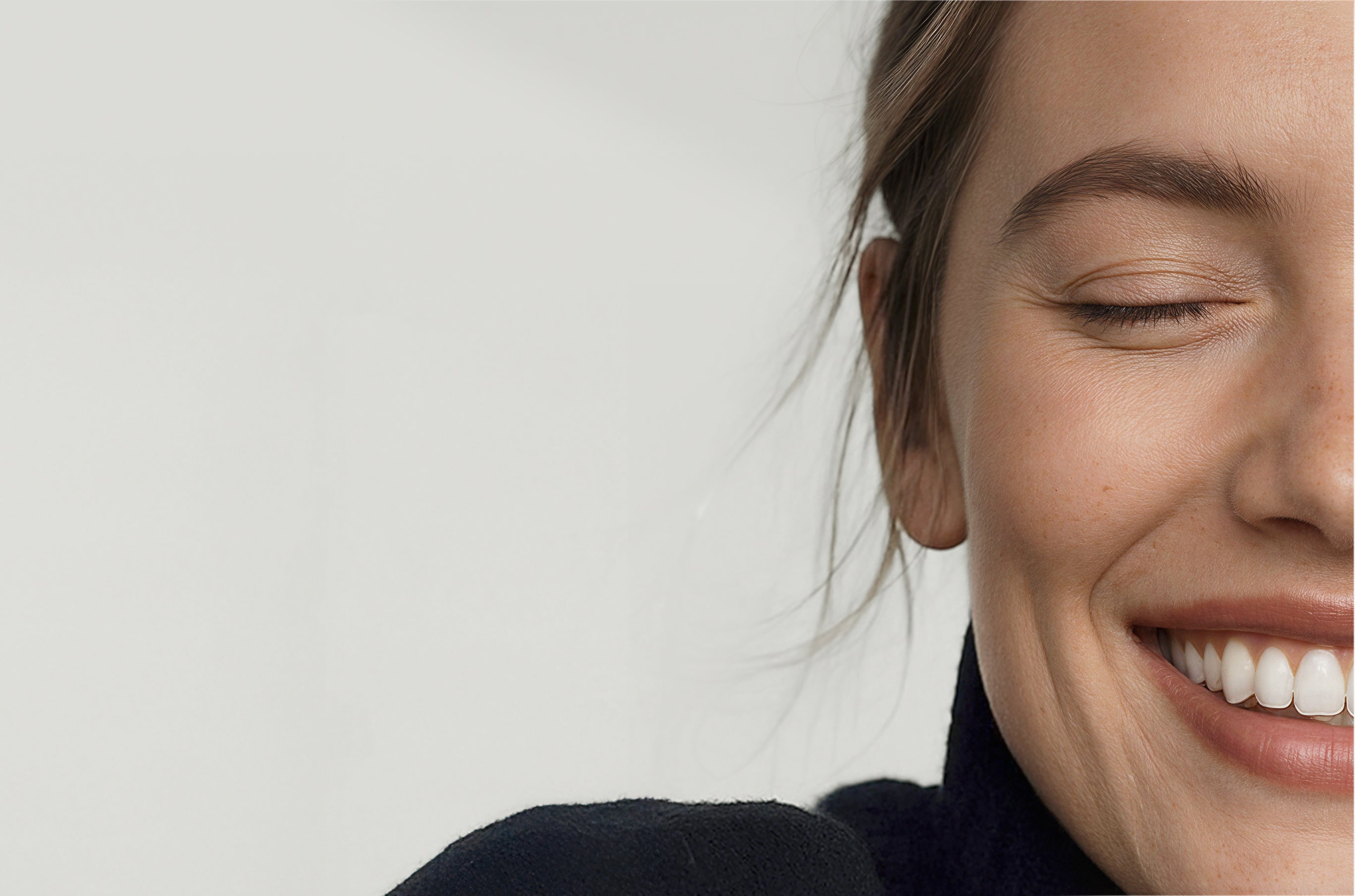 Postbiotics for Stress: Woman smiling  - postbiotics