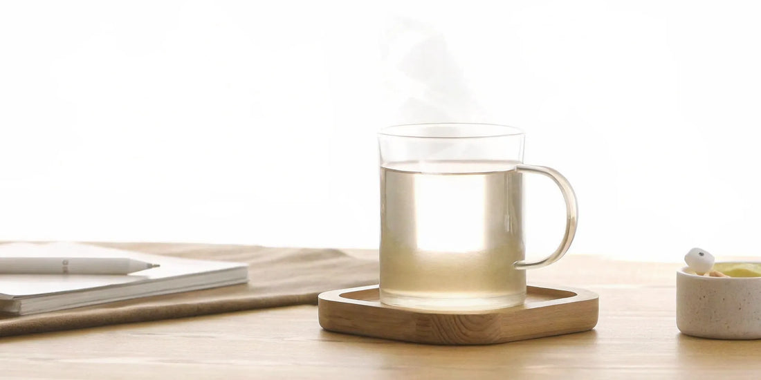 A glass of water for a mood-balancing morning routine.