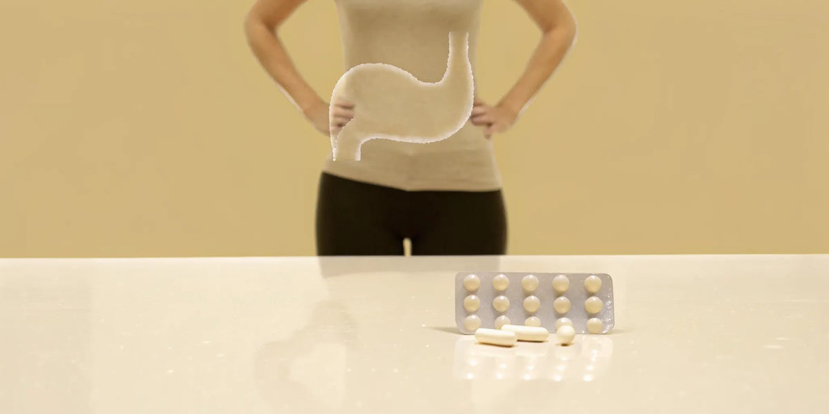 Can probiotics make SIBO symptoms worse? Capsules shown next to a stomach with bloating.