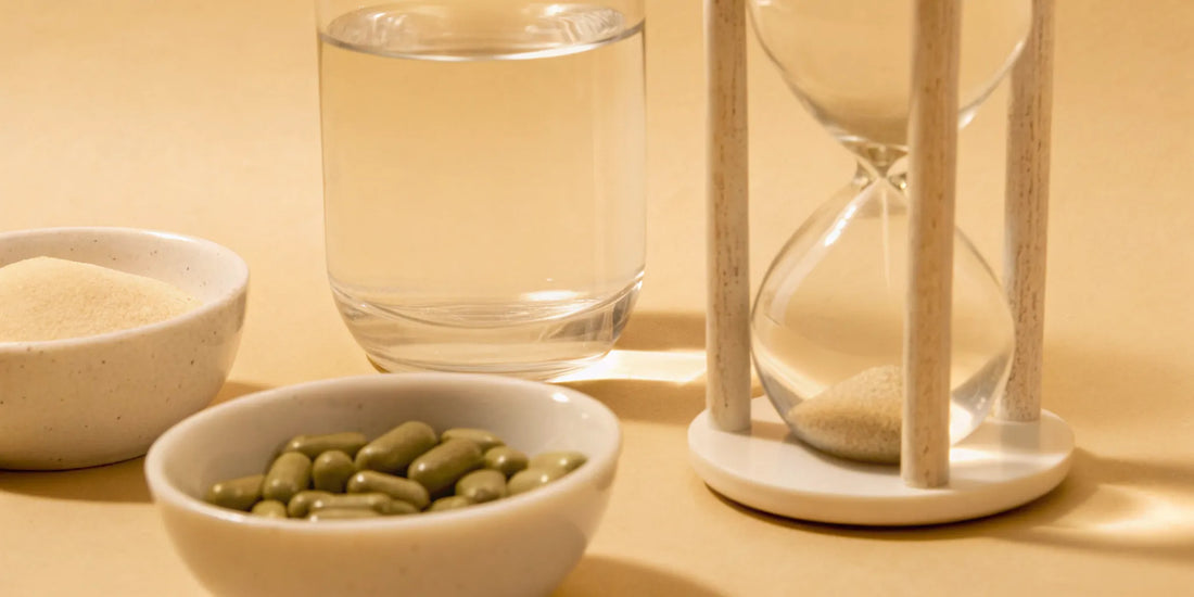 An hourglass timing how long gut health supplements take to improve digestion and regularity.