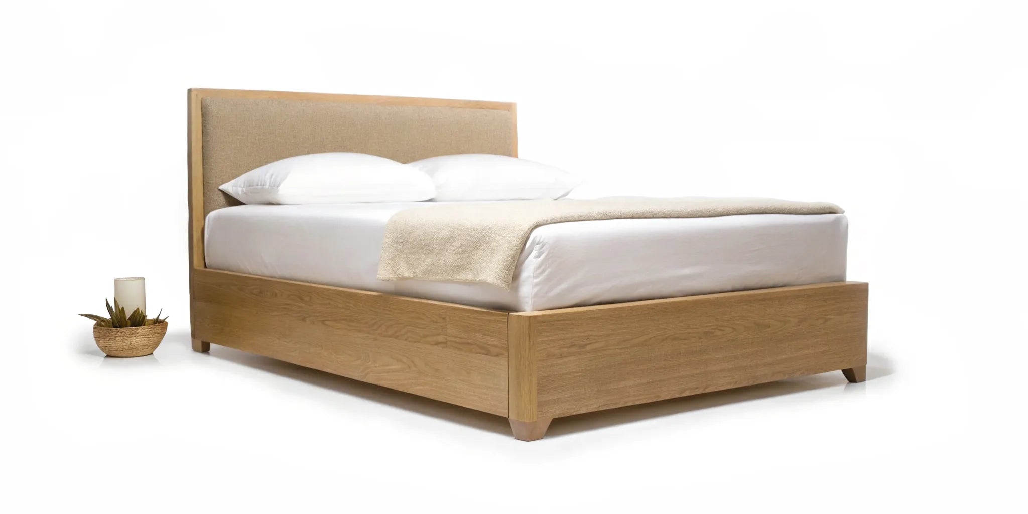A minimalist bed in a calm room, set up for mood balance and better sleep.
