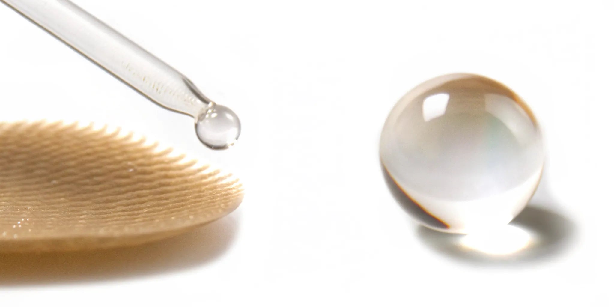 Postbiotic serum dropper and hydrating gel sphere for optimal skin health and barrier support.