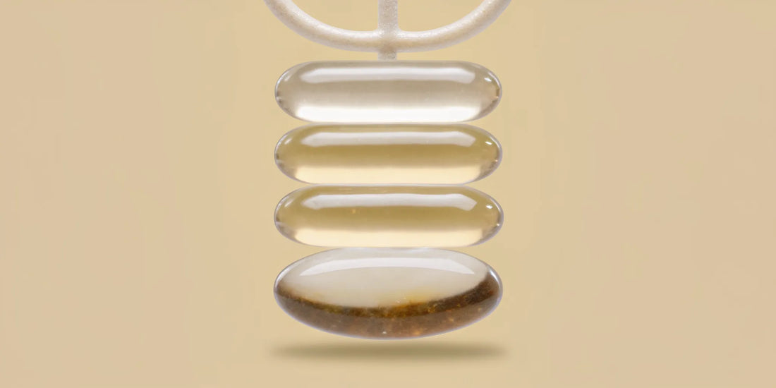 Postbiotic supplement capsules stacked to support gut bacteria balance.