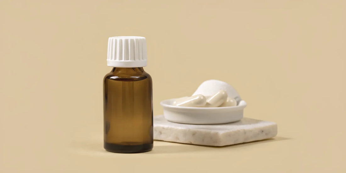 Amber bottle and capsules of a postbiotics supplement reviewed for bloating and brain fog.