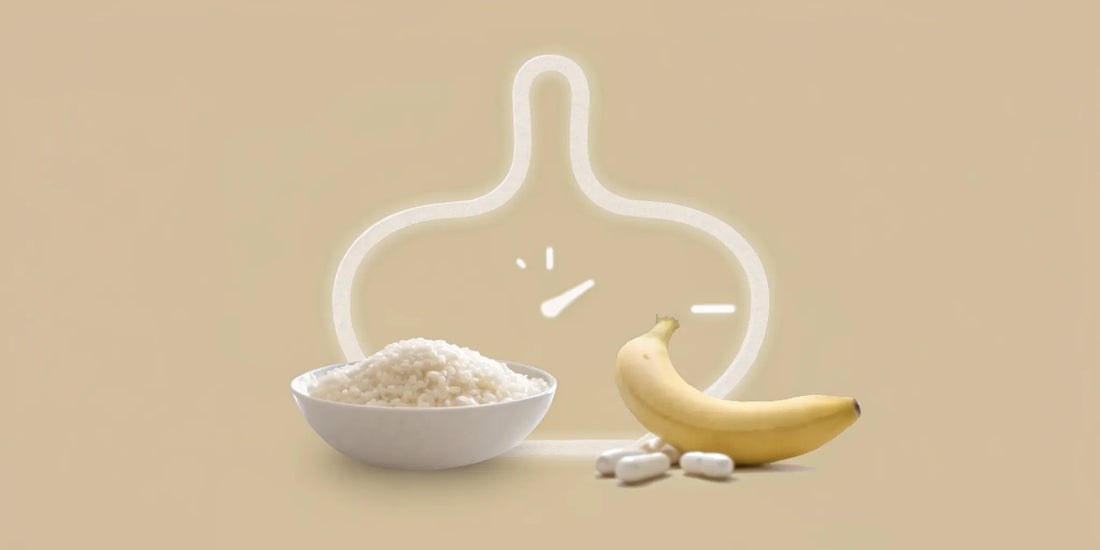 A bowl of rice, a banana, and supplements for sensitive stomach and diarrhea.