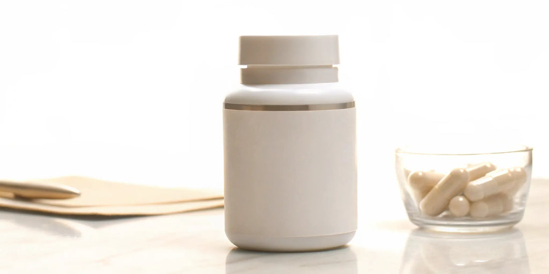 Gut Balance postbiotic supplement bottle and capsules, a supplement to buy for gut balance.