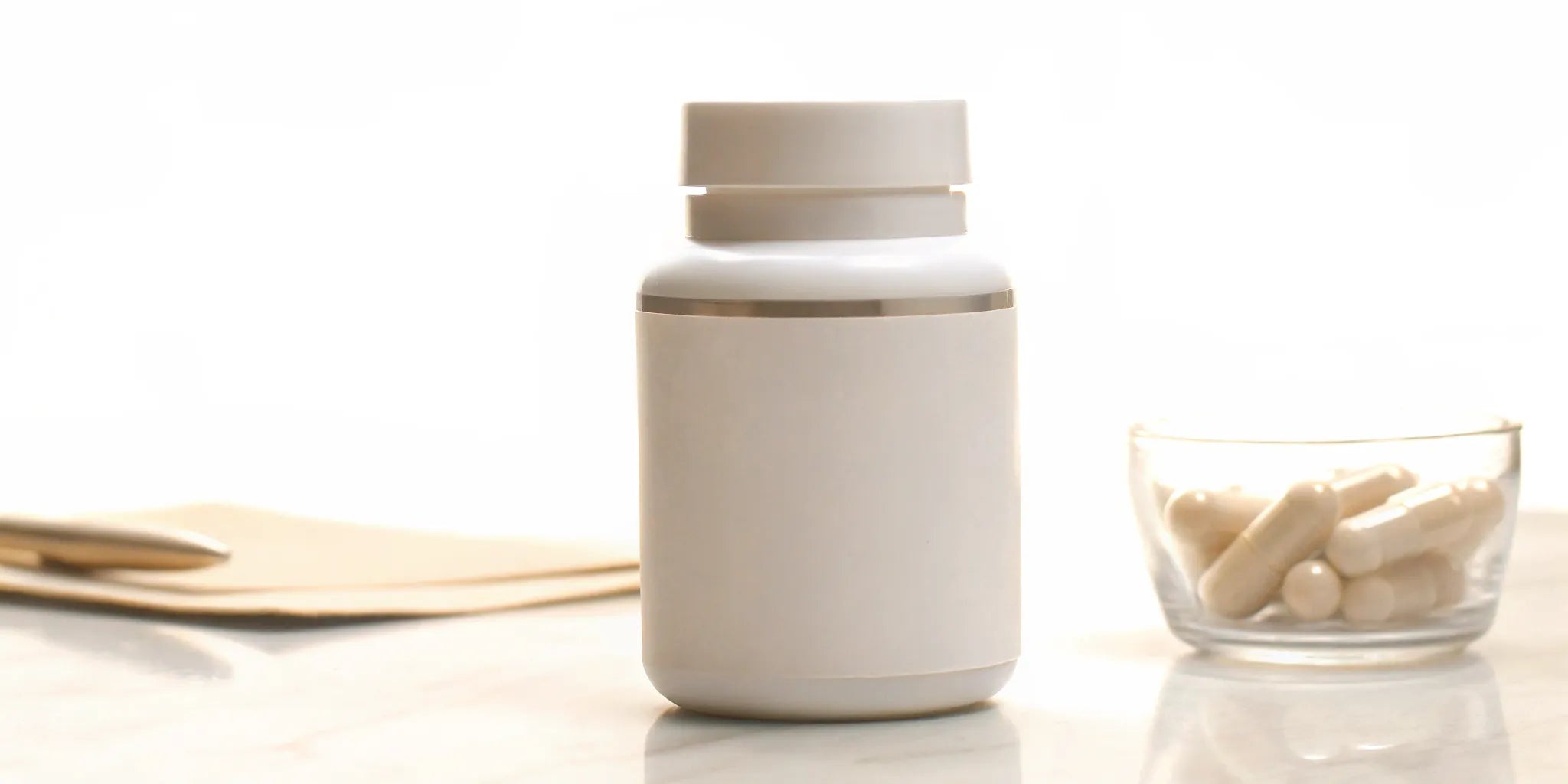 Gut Balance postbiotic supplement bottle and capsules, a supplement to buy for gut balance.