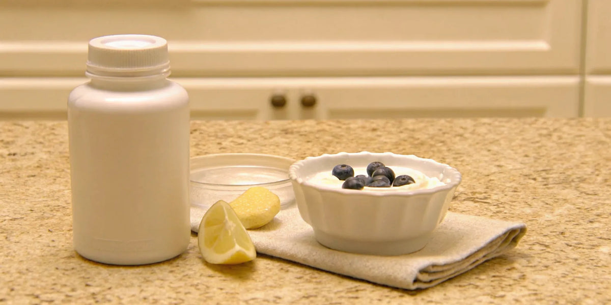 What to expect when starting a gut health supplement, with a bottle next to a healthy yogurt breakfast.