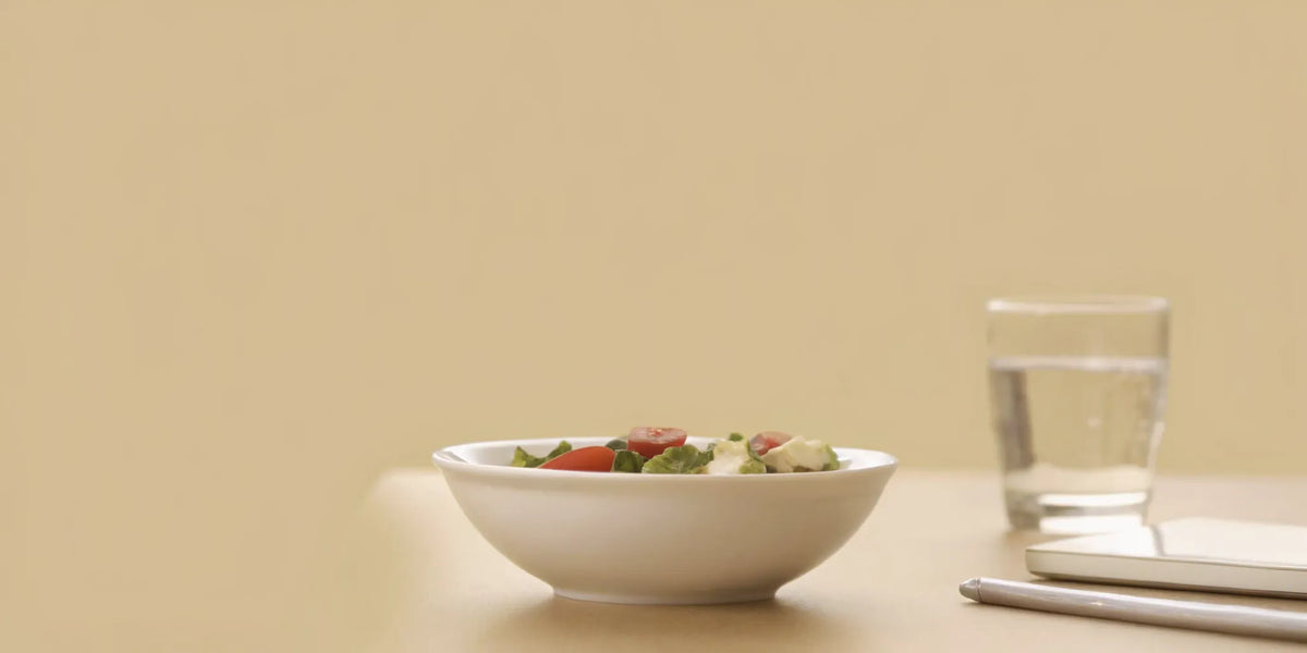 A healthy salad, as stress can cause bloating even if you maintain a healthy diet.