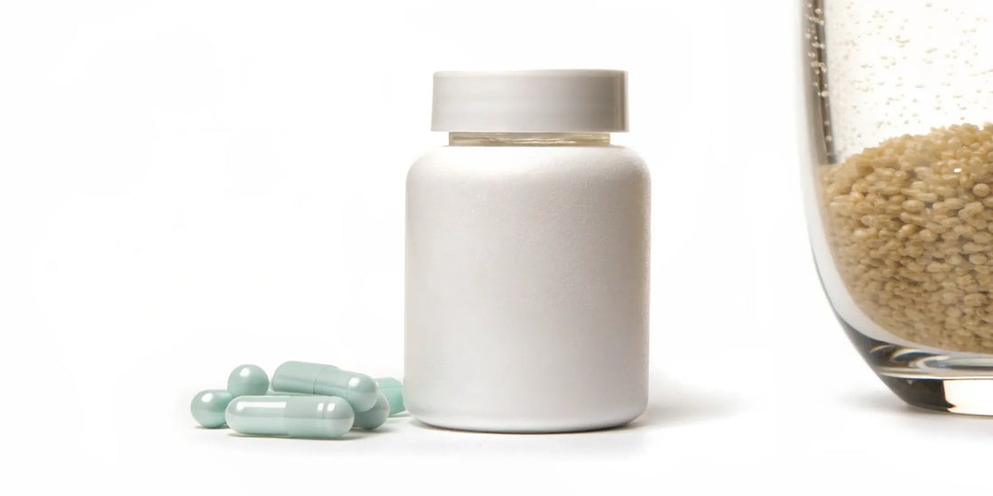 Bottle and capsules of a gut health supplement for bloating.