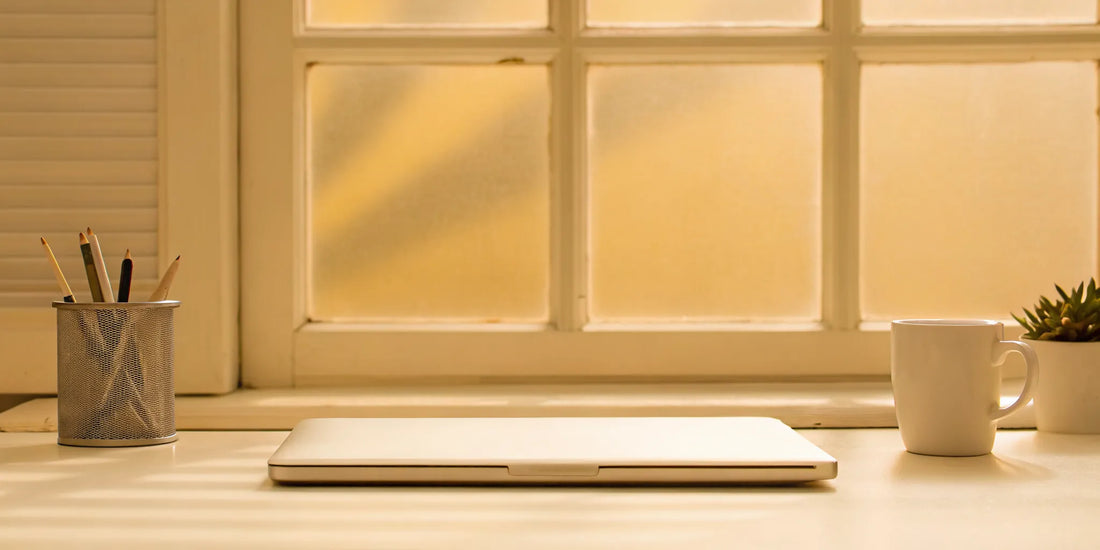 A calm desk with coffee, a setting for finding mood balance to overcome fatigue.