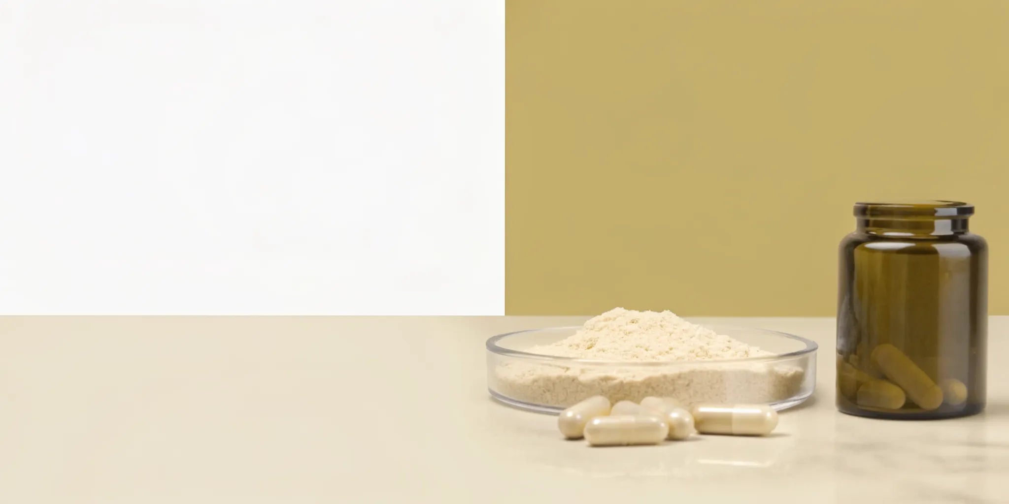 An amber bottle of postbiotic supplements with capsules and powder.