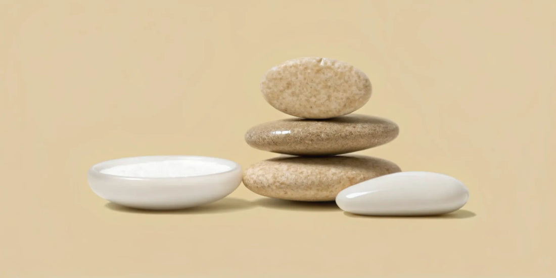 A calm stack of smooth stones representing a balanced approach to bloating relief.